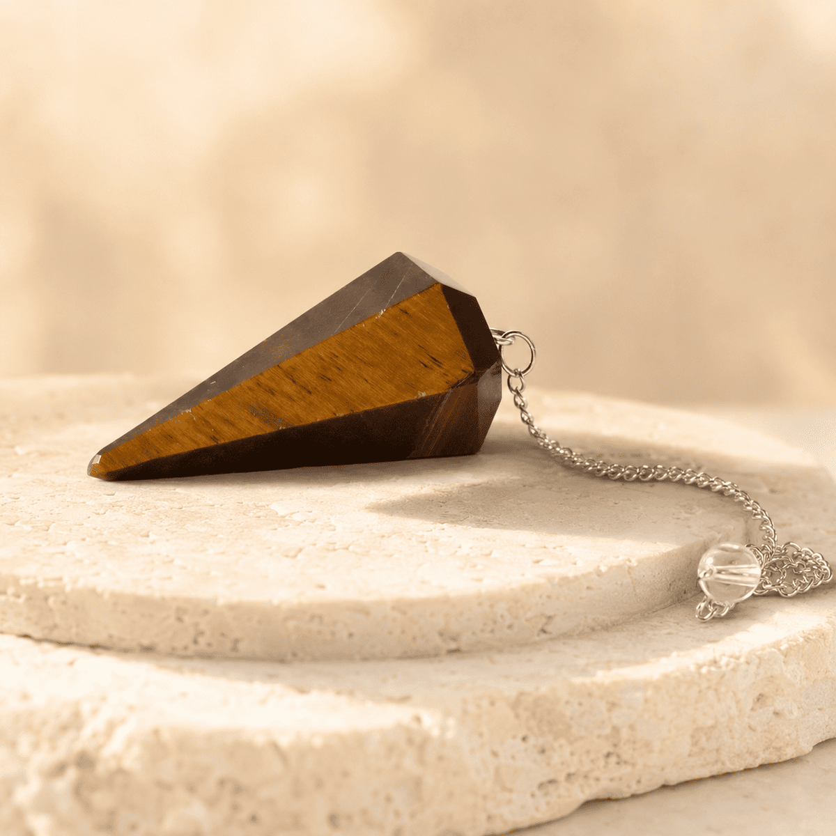 Tiger’s Eye Faceted Crystal Pendulum – Thorn & Thimble