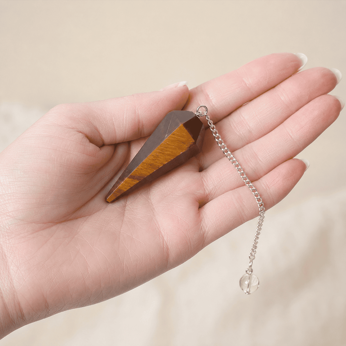 Tiger’s Eye Faceted Crystal Pendulum – Thorn & Thimble