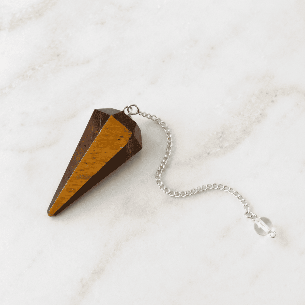 Tiger’s Eye Faceted Crystal Pendulum – Thorn & Thimble